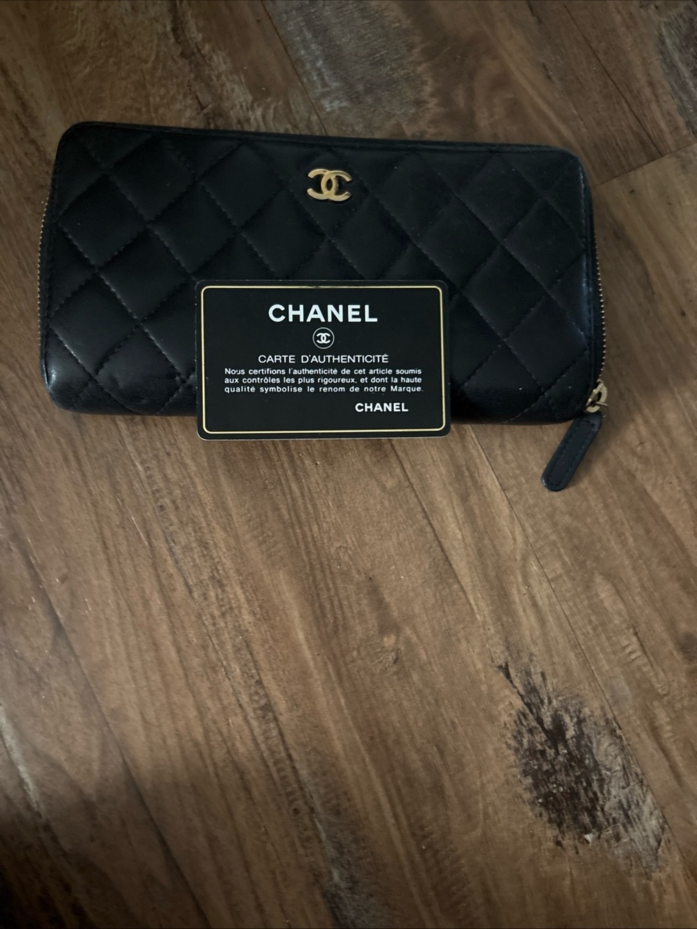 CHANEL Black Quilted Zip Around Wallet with Gold CC